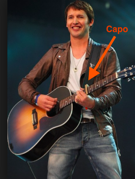 James Blunt with a guitar capo
