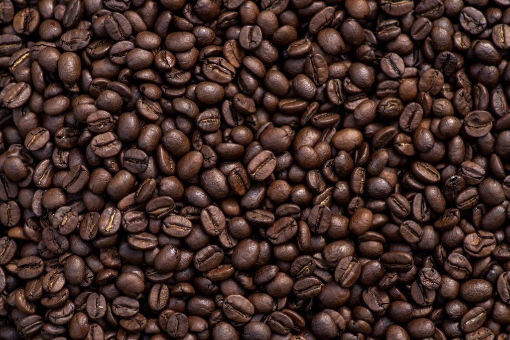 Arabica vs Robusta coffee: Arabica coffee beans on a container